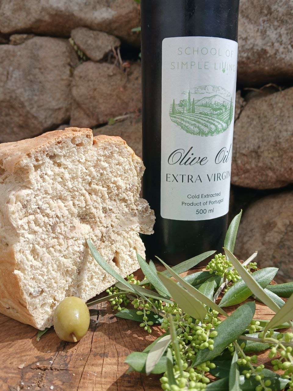 Fresh olive oil drizzled over rustic bread in Portugal