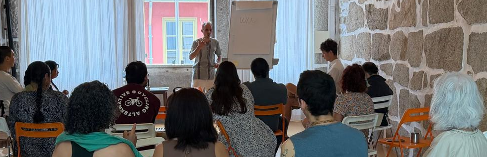 Ben Bharat Berwing facilitating a Transformative Communication session at the Porto venue
